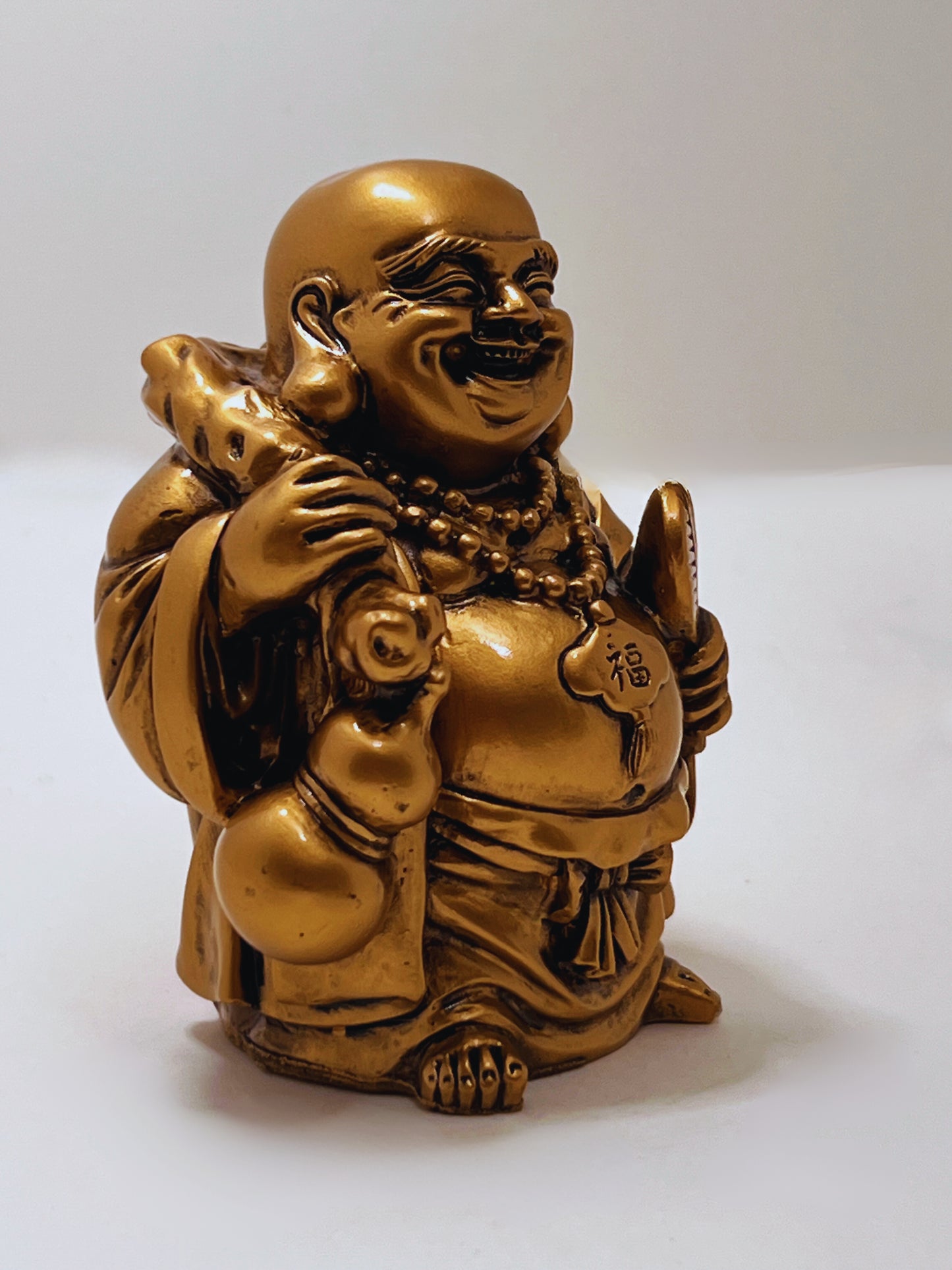 Golden Joyful Buddha Statue